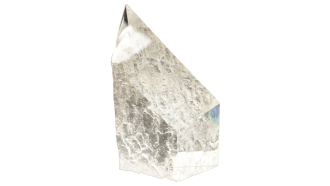 A geometric clear glass art piece.