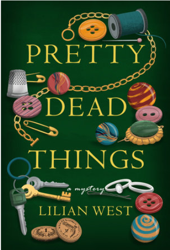Button, thread, a thimble, and other related items on a green background adorn the cover of Pretty Dead Things by Lilian West.
