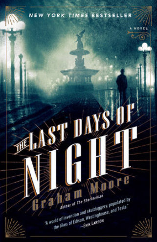A sillhouette is seen on a misty street in front of an elaborate foutain on the cover of The Last Days of Night by Graham Moore.
